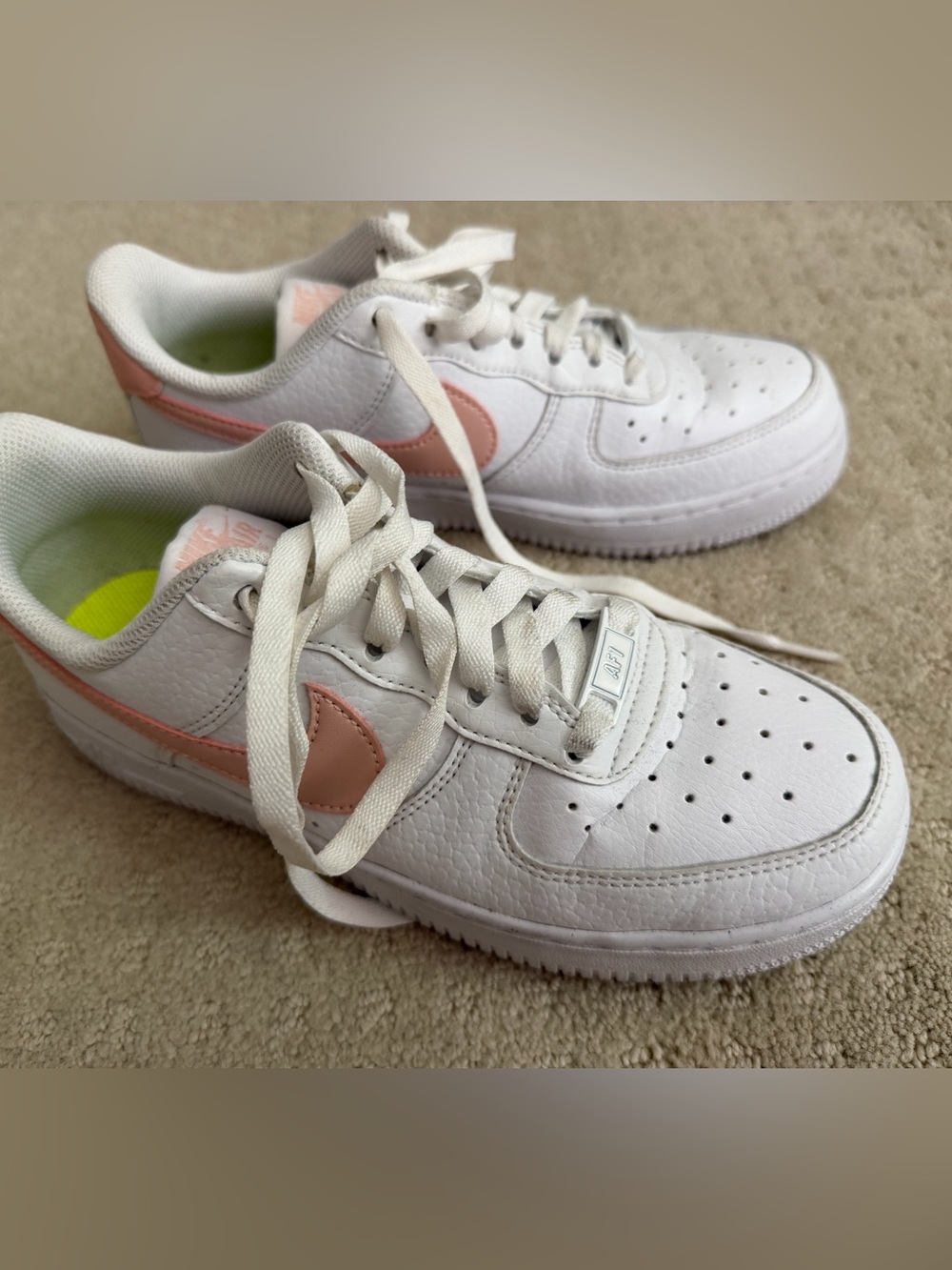 Nike Air Force 1 White Leather Sneakers with Pink Swoosh